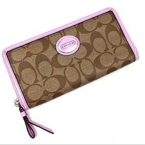 Coach signature brown fabric with pink leather trim zip around wallet